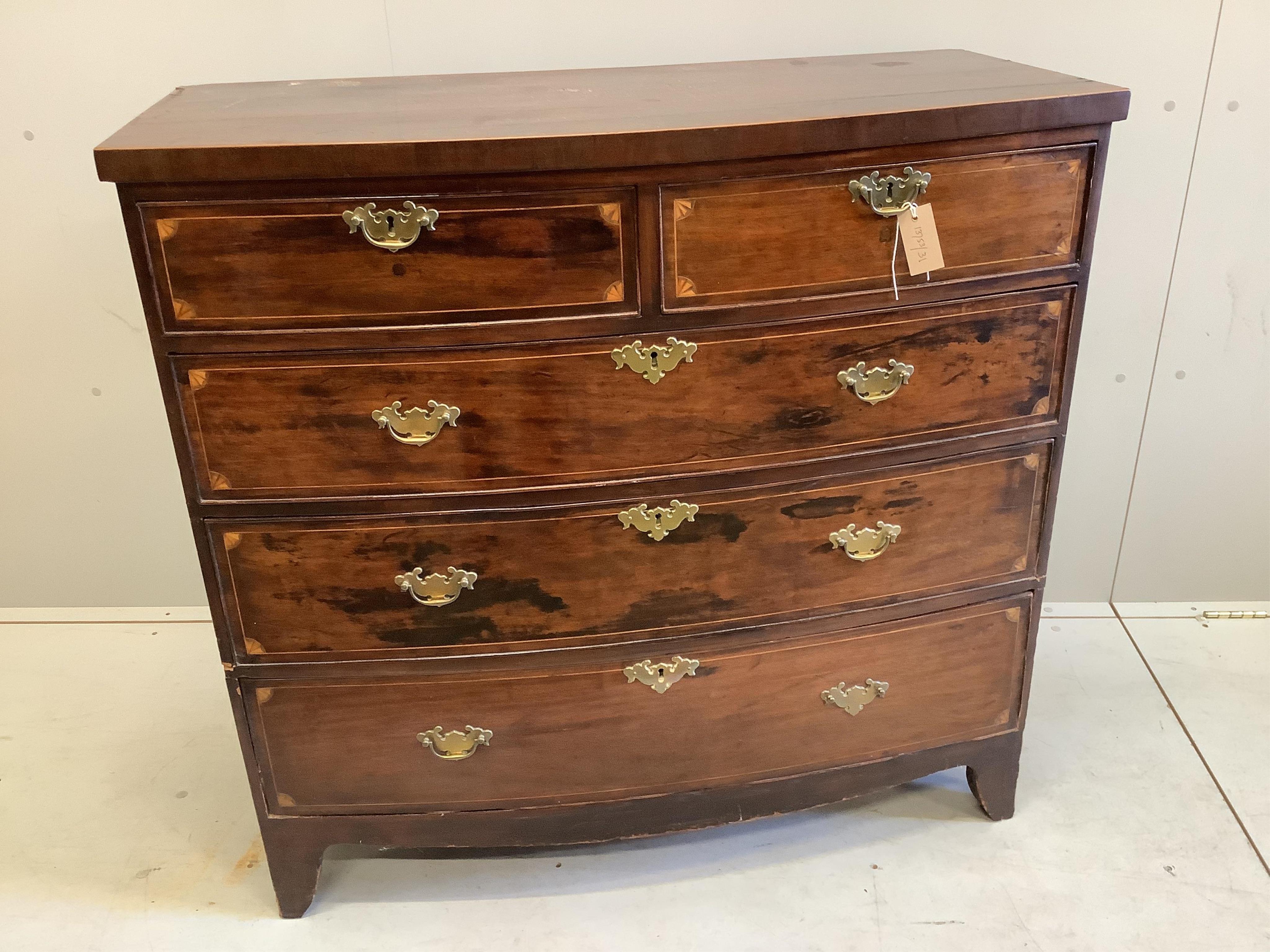 A late Georgian mahogany bowfront chest fitted two short and three long drawers, line and fan inlay, brass handles on splay bracket feet, width 106cm, depth 50cm, height 101cm